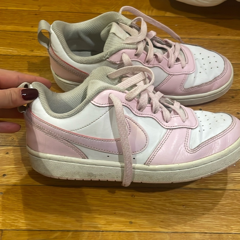 These are white and pink nike dunks size 7 USA and 38 EUR.